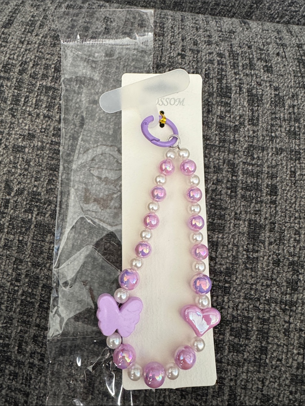 Purple Beaded Phone Wristlet with Butterfly & Heart Charm .